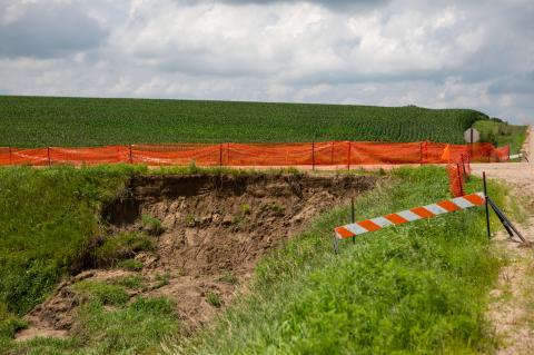 Barricades are up at the intersection of Road 881 and Avenue 575 in Hartington, Neb., on Sunday, July 15, 2018. 